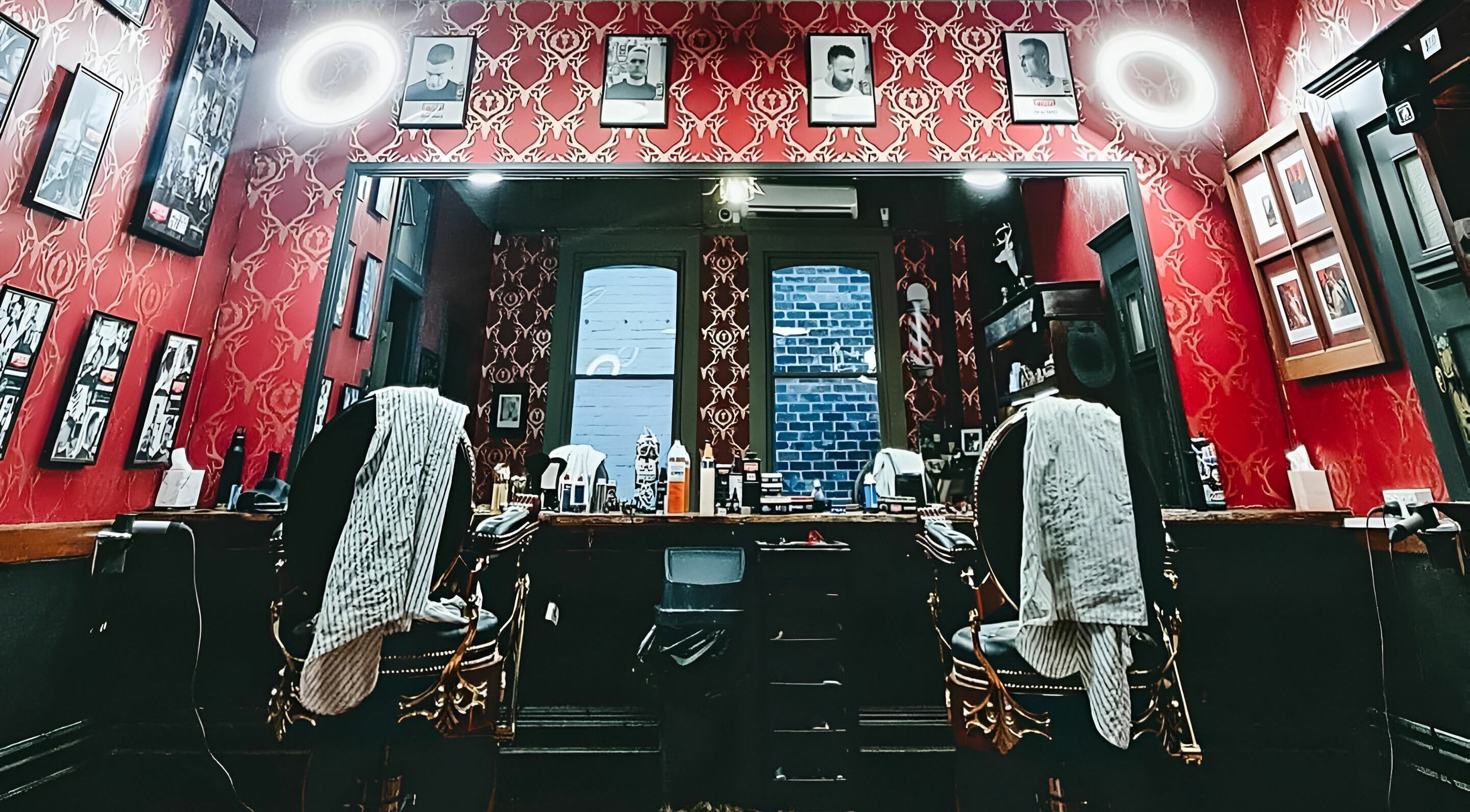 Interior of The Kingsway Barbershop in Launceston, Tasmania, AU with vintage decor and barber chairs.