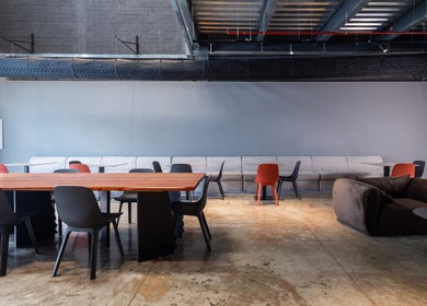 Modern interior seating area at Lvls Barbershop in Dubai, Dubai, AE, showcasing sleek furniture and design.