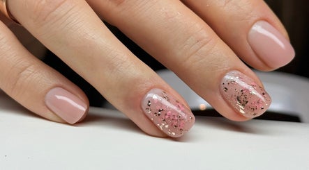 Stylish pink and gold glitter manicure at NatTal Beauty, Worcester, England, GB.