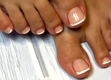 French pedicure at NatTal Beauty in Worcester, England, GB showcasing perfectly manicured toes.