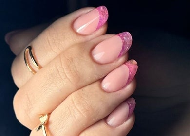 Elegant pink-tipped nails at NatTal Beauty in Worcester, England, GB, showcasing expert nail art.