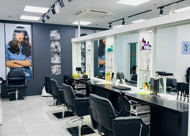 LE STUDIO TAMARIN's chic interior with styling chairs and products in Tamarin, Rivière Noire, MU.