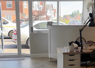 Bright and welcoming entry at Mani by Cody Thompson in Solihull, England, GB with modern decor and ample natural light.