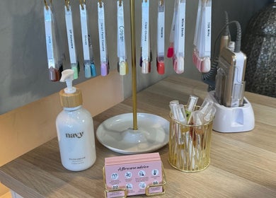 Nail color samples at Mani by Cody Thompson in Solihull, England displayed on a countertop.
