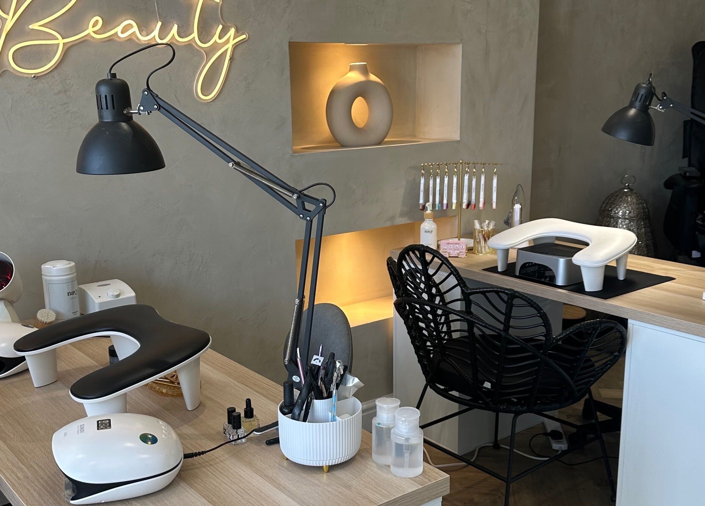 Interior of Mani by Cody Thompson in Solihull, England, GB showcasing stylish nail stations.