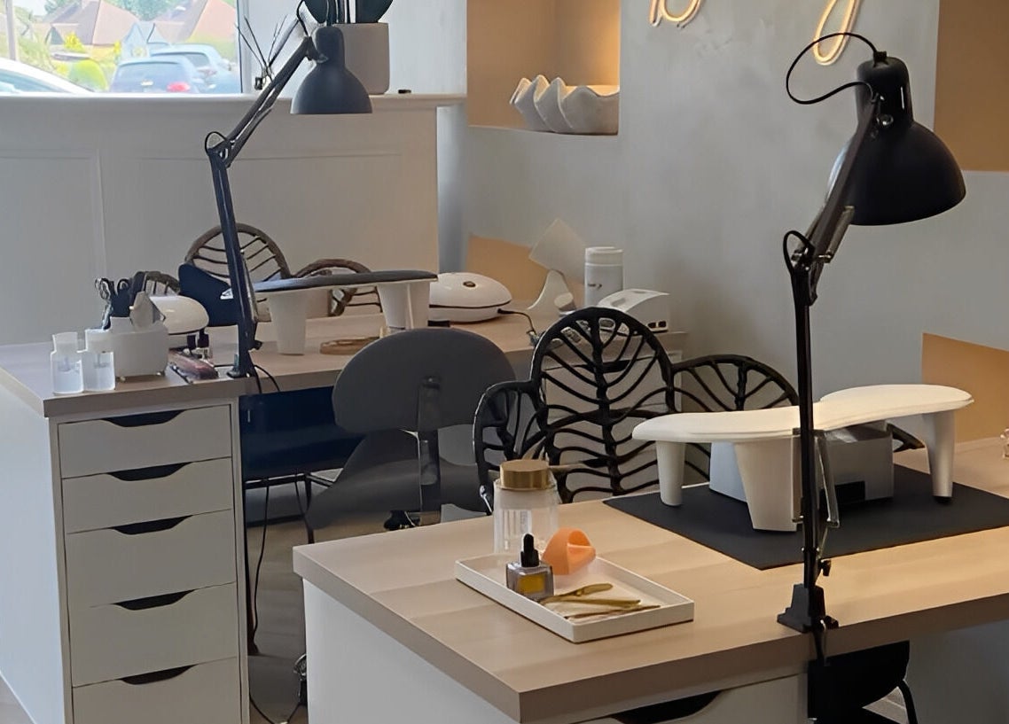 Modern nail station at Mani by Cody Thompson, Solihull, England, GB, featuring stylish decor and equipment.