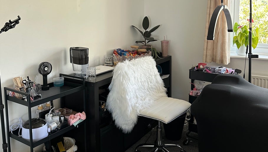 Glowing lash station at AC Lashes, Chandler's Ford, England, GB, showcasing a sleek setup for beauty treatments.