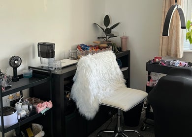 Glowing lash station at AC Lashes, Chandler's Ford, England, GB, showcasing a sleek setup for beauty treatments.