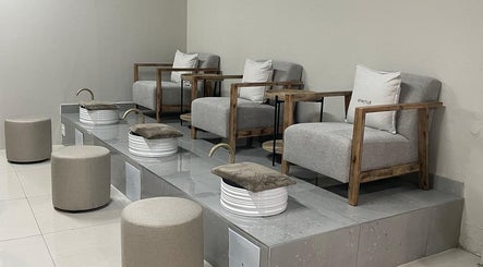 Modern pedicure chairs at D'ntle Beauty Randburg, Randburg, Gauteng, ZA, offering a serene wellness experience.