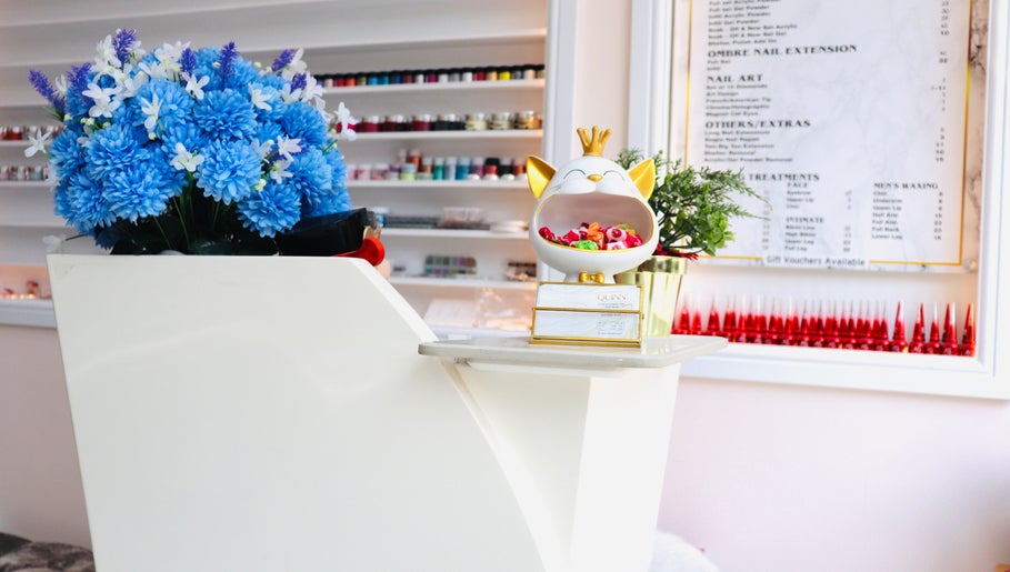 Reception area at Quinn Nails and Beauty Richmond, showcasing vibrant decor and colorful accents. Richmond, England, GB.