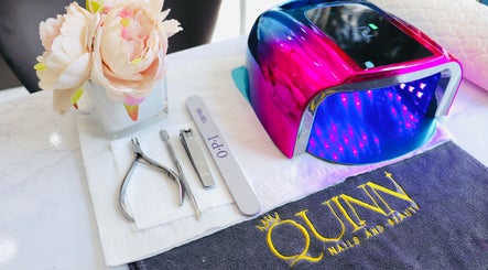 Nail tools and LED lamp at Quinn Nails and Beauty Richmond, Richmond, England, GB, with a floral decor.