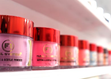Colorful acrylic nail powders at Quinn Nails and Beauty Richmond, Richmond, England, GB.