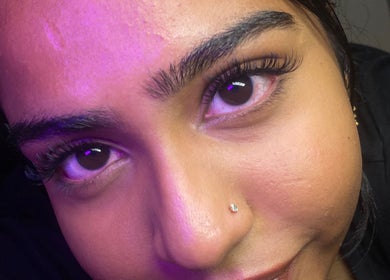 Close-up of a woman with styled brows at Blinked Boutique in London, England, GB.