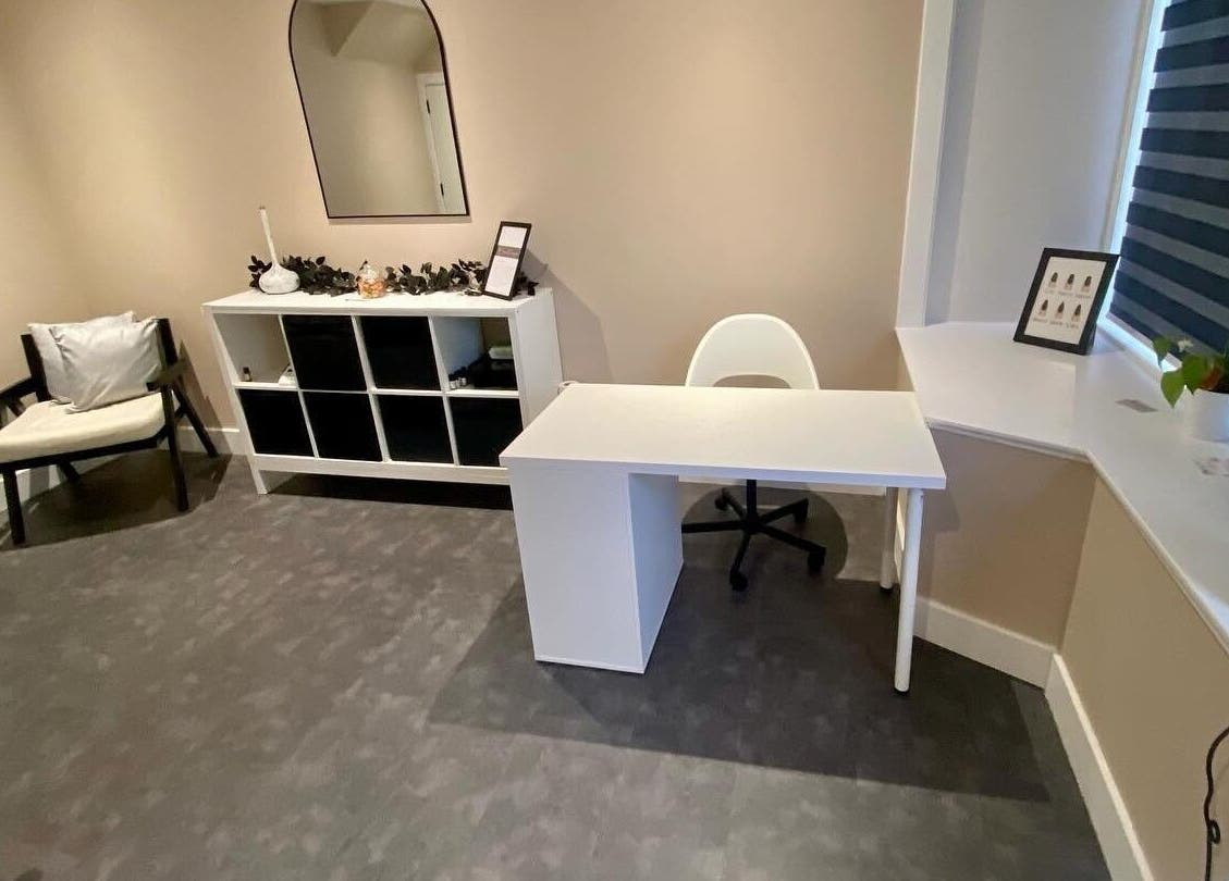 Chic interior of Beyond Beauty by Louise, Ayr, Scotland, GB with modern decor and comfortable seating.