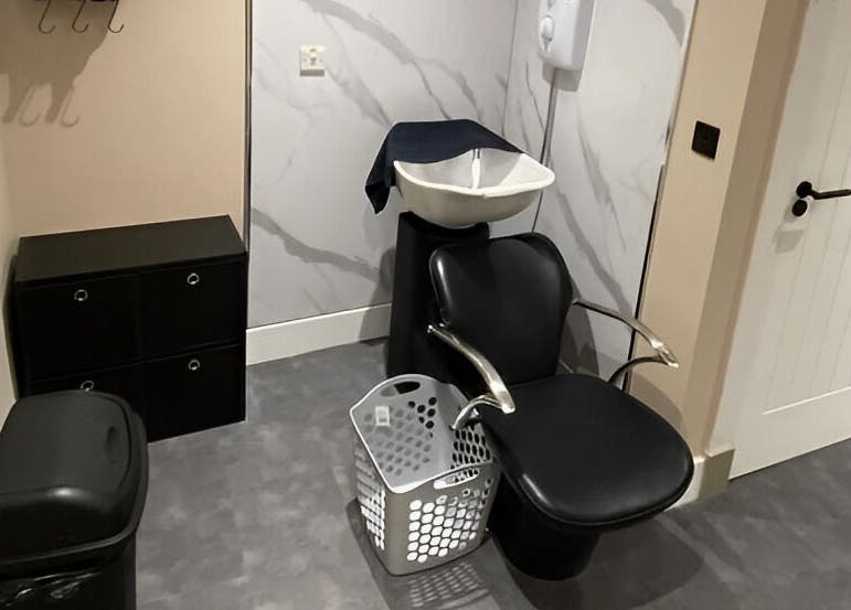 Modern salon chair and washbasin at Beyond Beauty by Louise in Ayr, Scotland, GB.