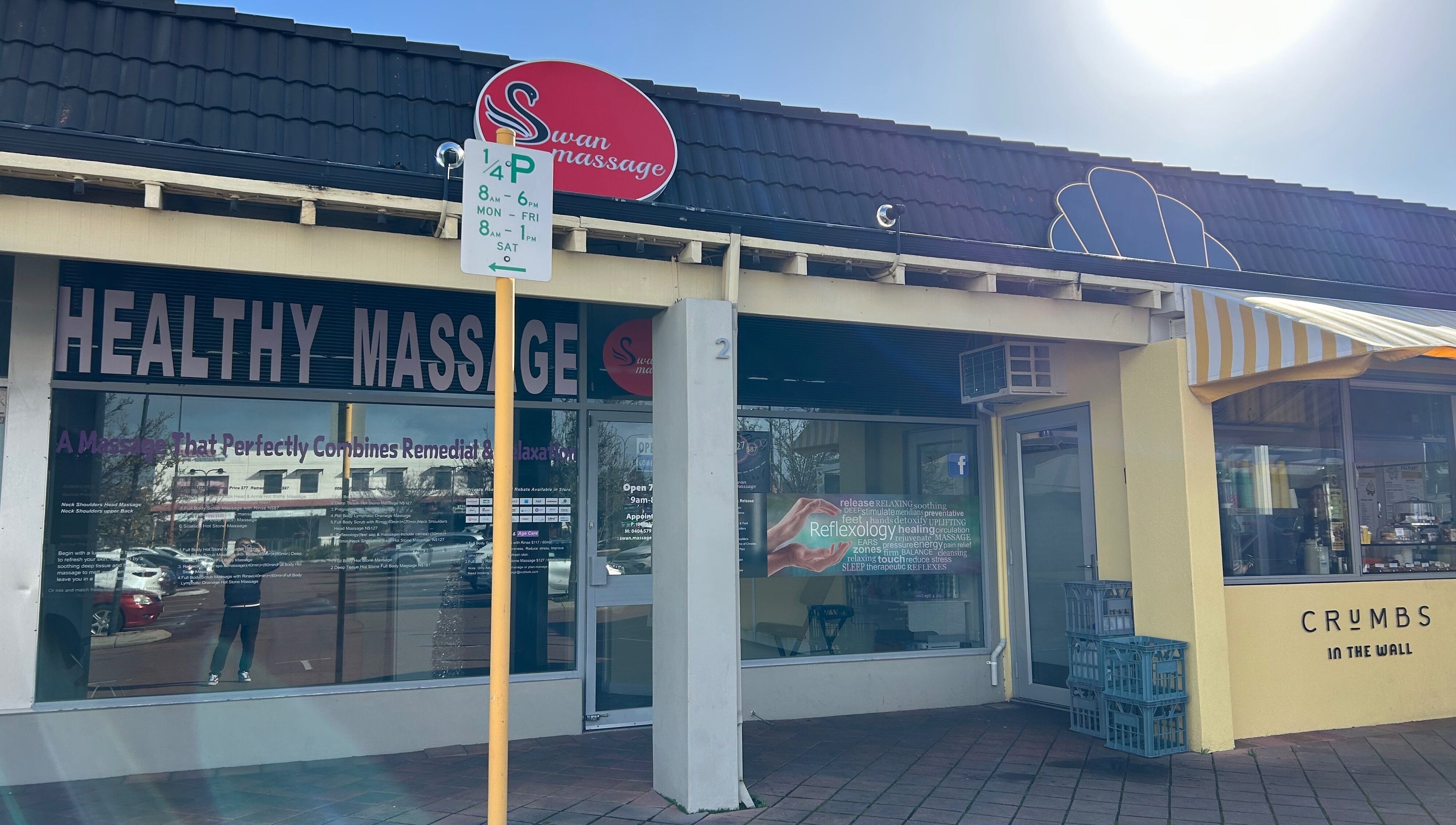 Entrance of Swan Massage in Osborne Park, Western Australia, AU under a sunny sky.
