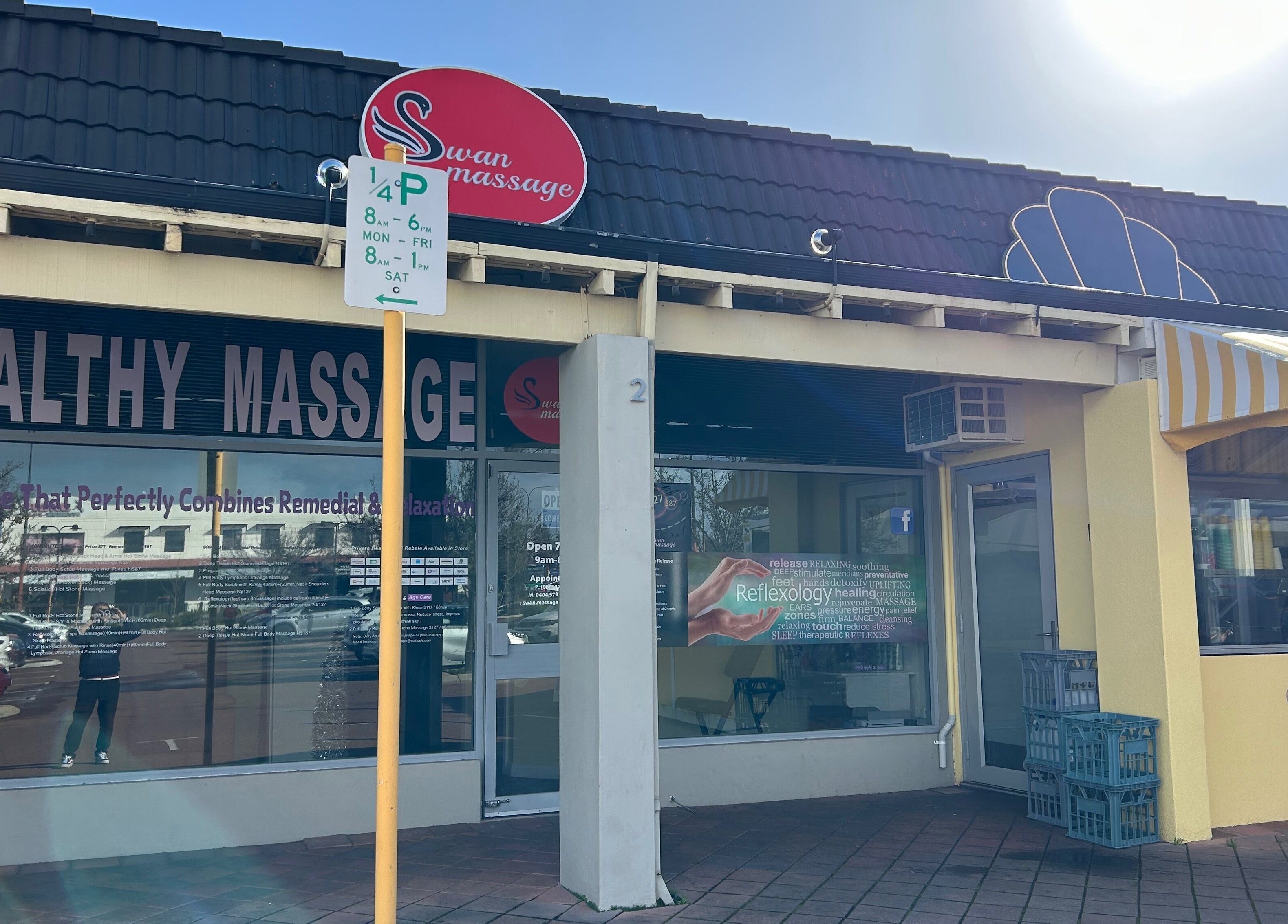 Entrance of Swan Massage in Osborne Park, Western Australia, AU under a sunny sky.