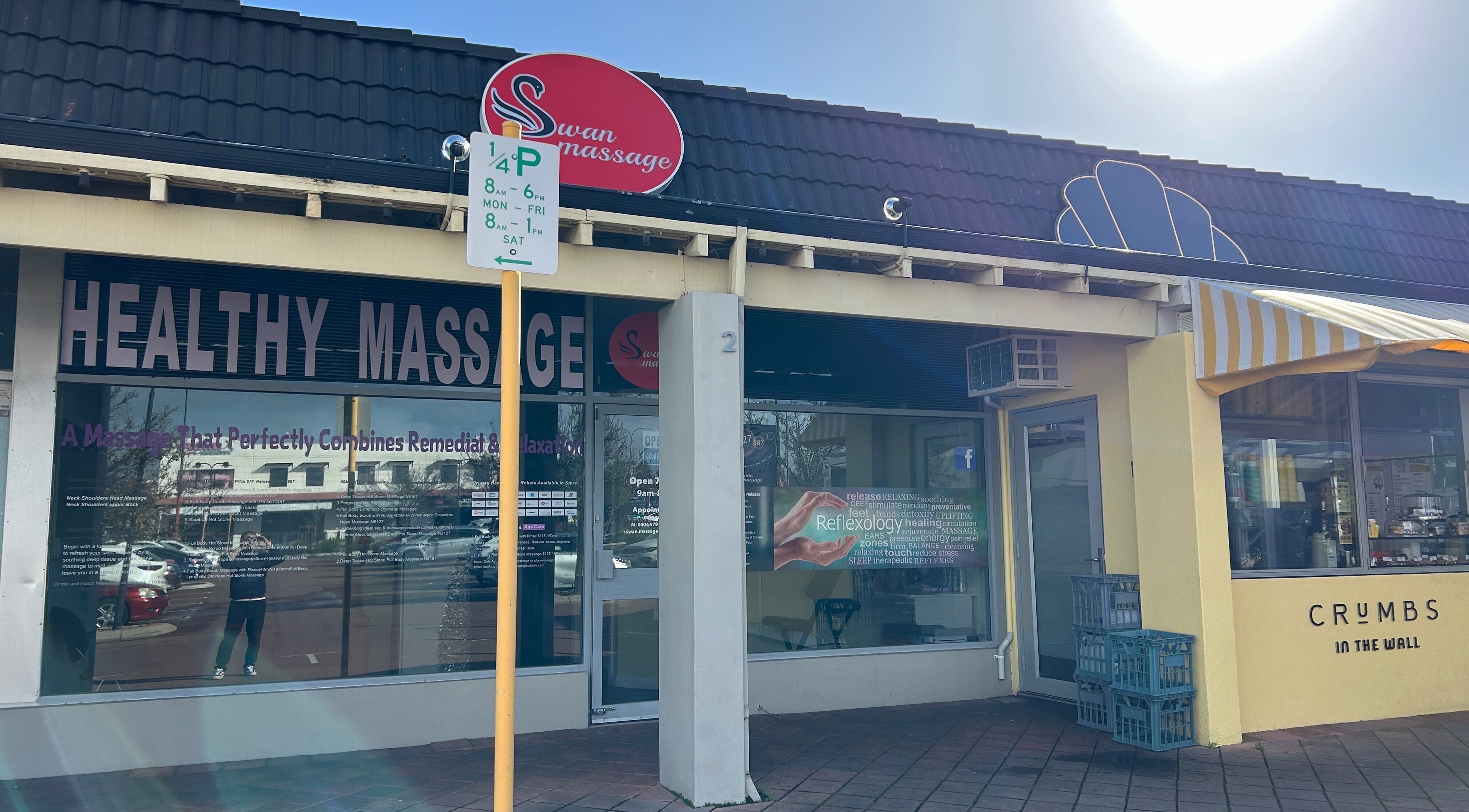 Entrance of Swan Massage in Osborne Park, Western Australia, AU under a sunny sky.