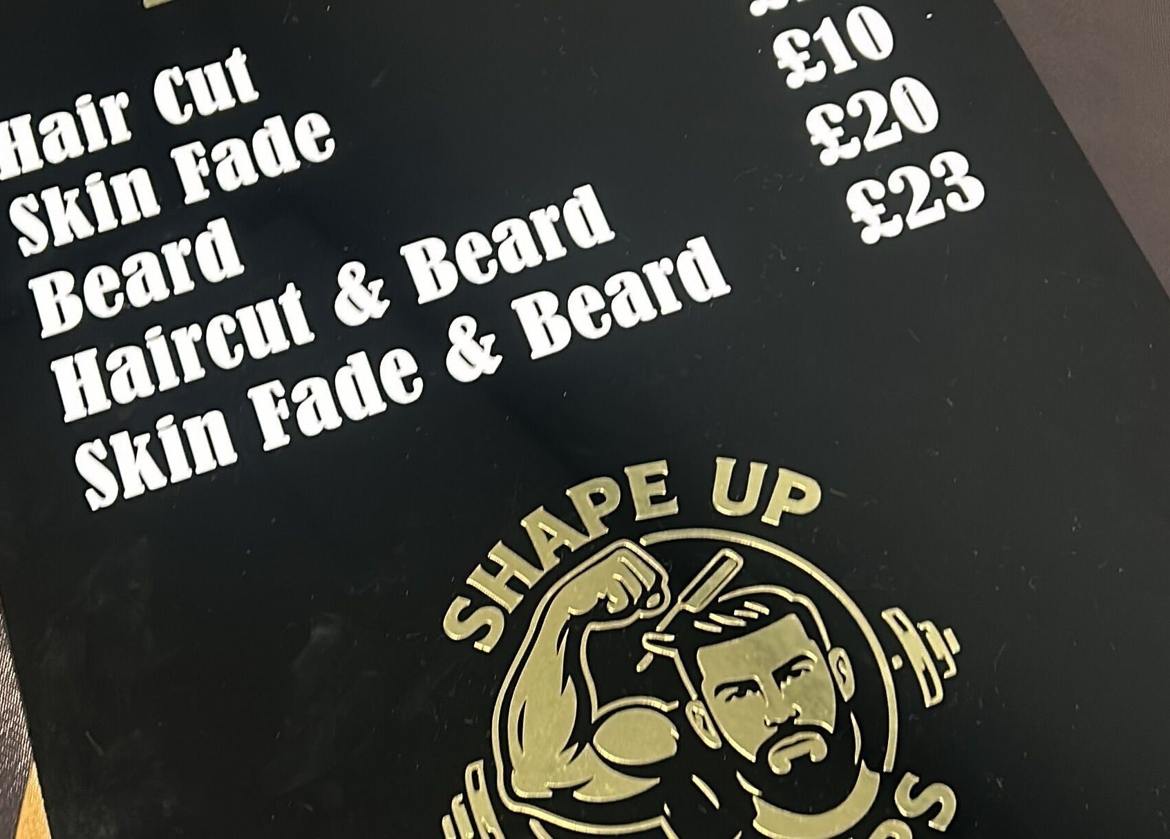 Shapeup.barbers price list featuring haircut, beard trim options in Bilston, England, GB.