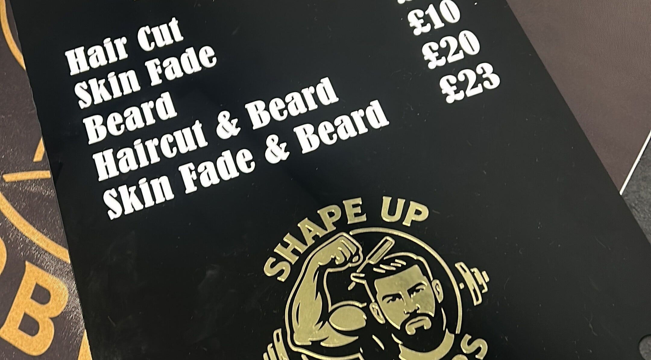 Shapeup.barbers price list featuring haircut, beard trim options in Bilston, England, GB.