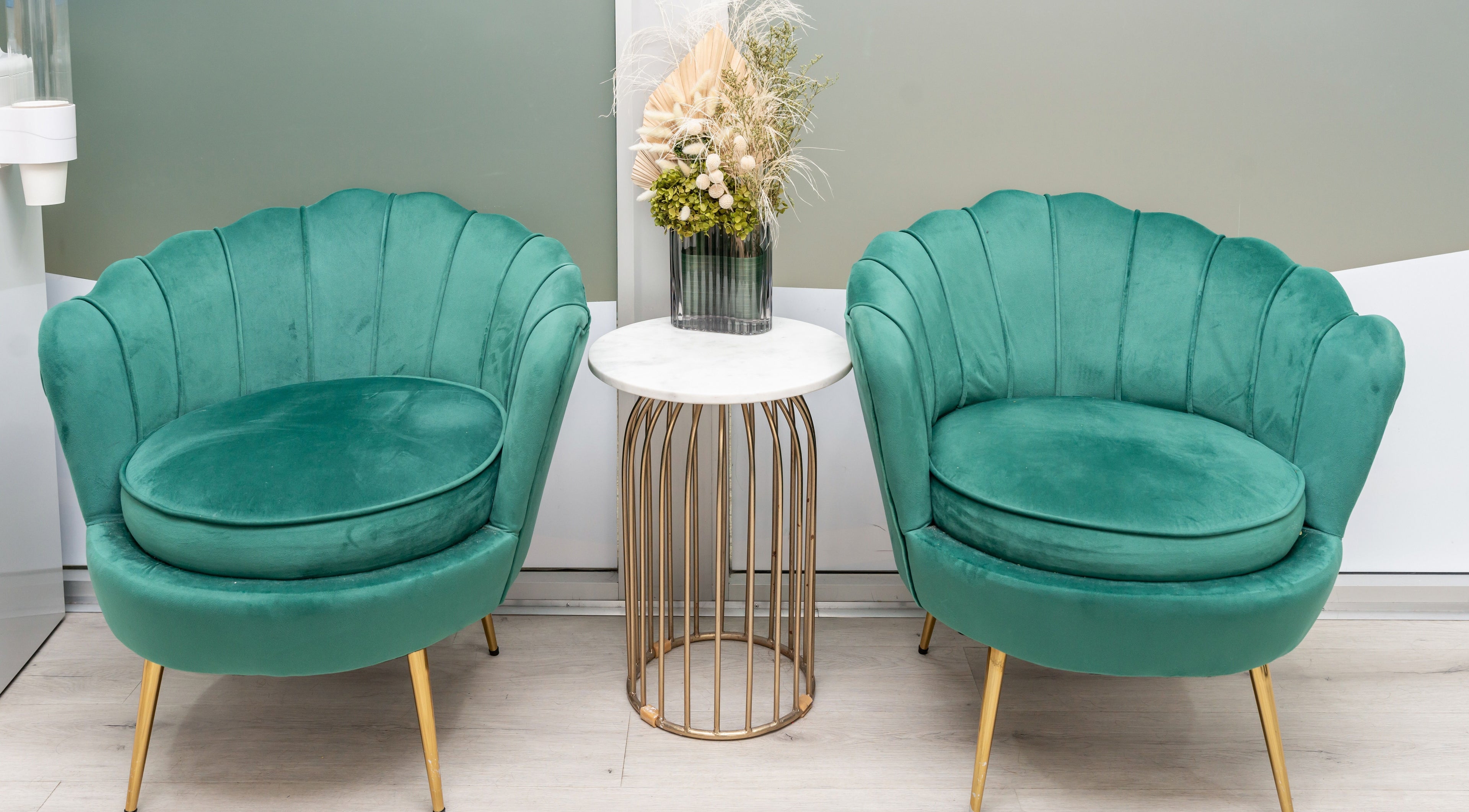 Elegant green chairs at Celtic Rootz & Co, Bangor, New South Wales, AU, enhancing a chic, relaxing atmosphere.