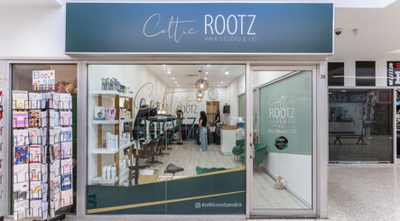 Front view of Celtic Rootz & Co salon at Bangor, New South Wales, AU with stylish interior and product displays.
