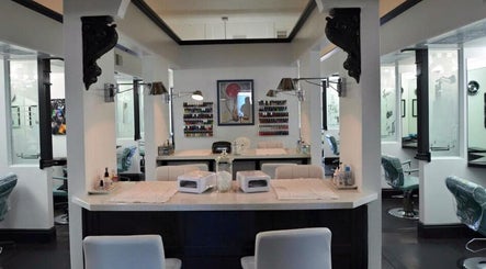Interior of Hair By Jessie G in Hedgesville, WV, US, featuring modern styling stations and chic decor.