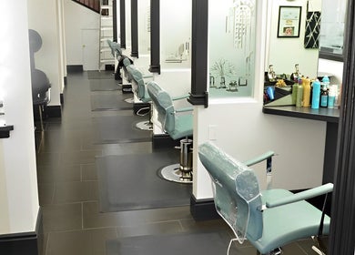 Interior of Hair By Jessie G salon, featuring stylish chairs and modern decor, Hedgesville, West Virginia, US.