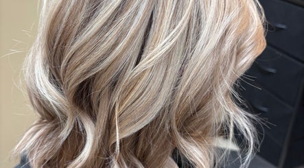 Styled blonde hair at Hair By Jessie G, Hedgesville, West Virginia, US. A showcase of elegant beauty.