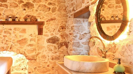 Elegant stone and wood wash area in Payam Spa & Wellness, Antalya, Antalya, TR offering serene ambiance.