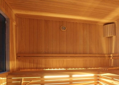 Luxurious sauna room at Payam Spa & Wellness in Antalya, Antalya, TR, featuring warm wooden interiors.