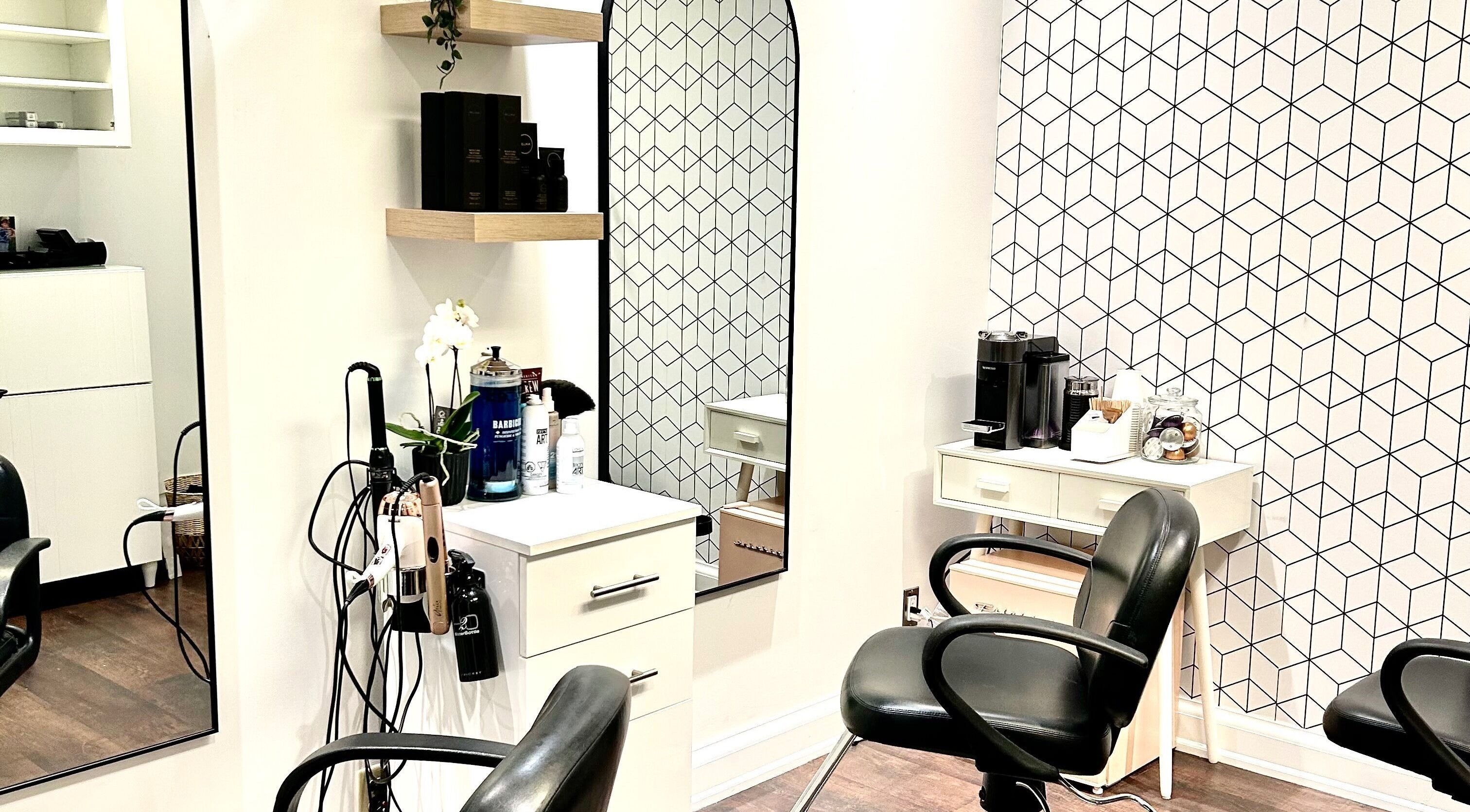 Chic interior of Vghair Studio in Toronto, Ontario, CA featuring stylish chairs and modern decor.