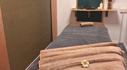 Relaxing massage room at Cosmecca Beauty and Spa in Port Louis, Port Louis District, MU with a cozy setup.