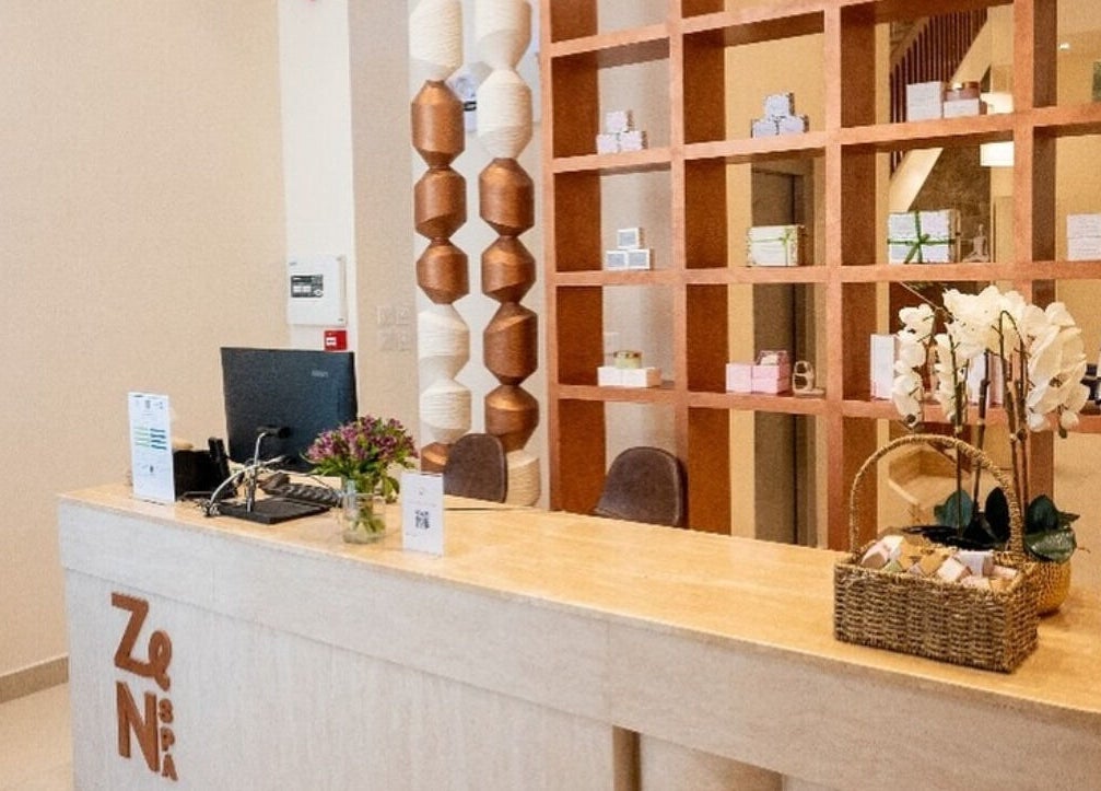 Reception area of Zen Spa I زن سبا in Riyadh, Riyadh Province, SA with modern decor and elegant floral arrangements.