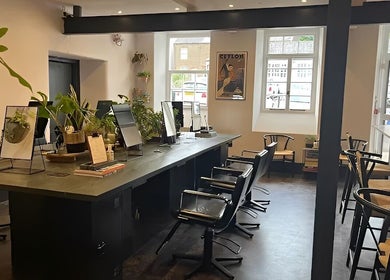 Craft Hairdressing in Tring, England, GB, featuring stylish salon chairs and modern decor.