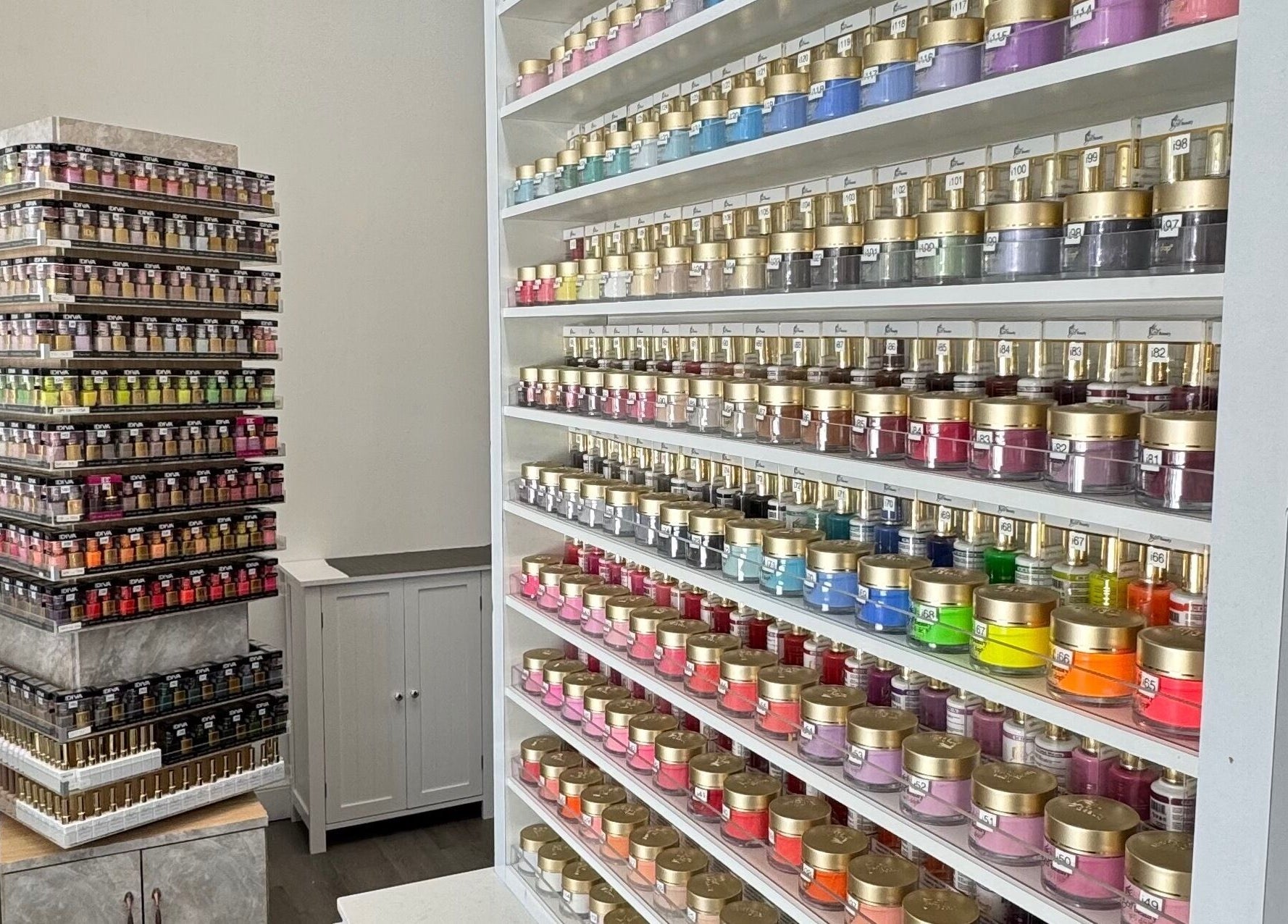 Vibrant nail polish display at D Nails and Spa Dracut, located in Dracut, Massachusetts, US.
