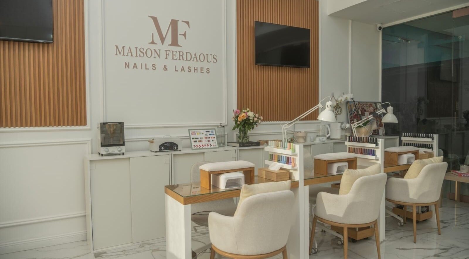 Elegant nail studio at Maison Ferdaous Nails & Lashes in Dubai, Dubai, AE with modern design and beauty setup.