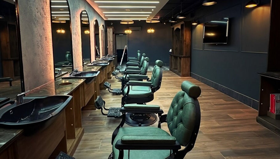 il-Mustaċċun Barber imagem 1