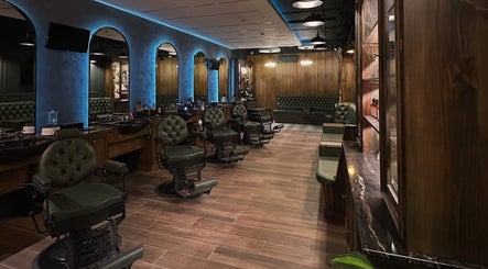 il-Mustaċċun Barber