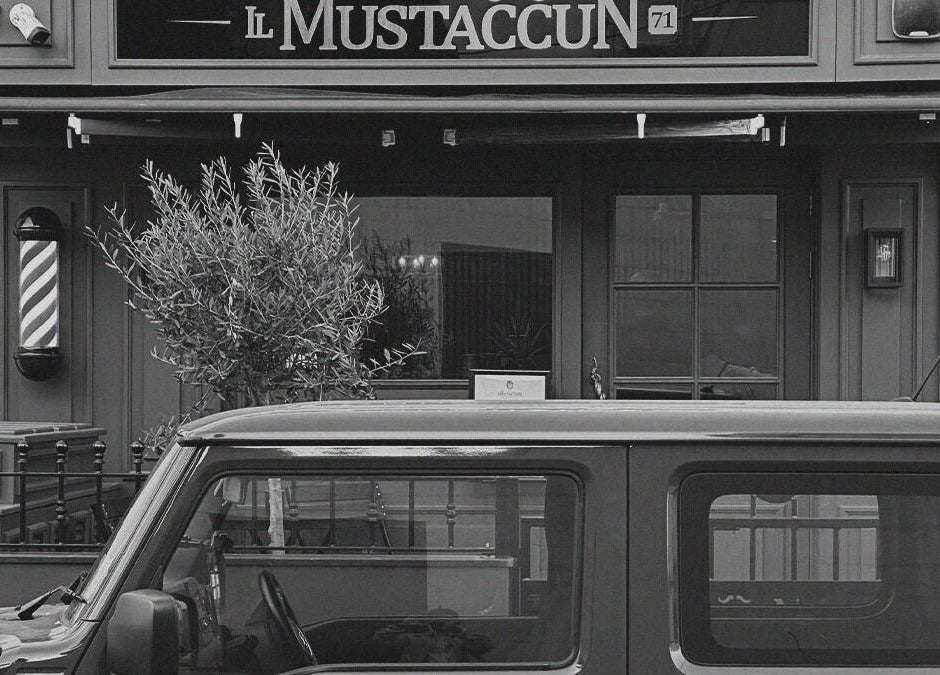 Front view of il-Mustaċċun Barber, a classic barbershop in Ħal Lija, MT with iconic barber pole.