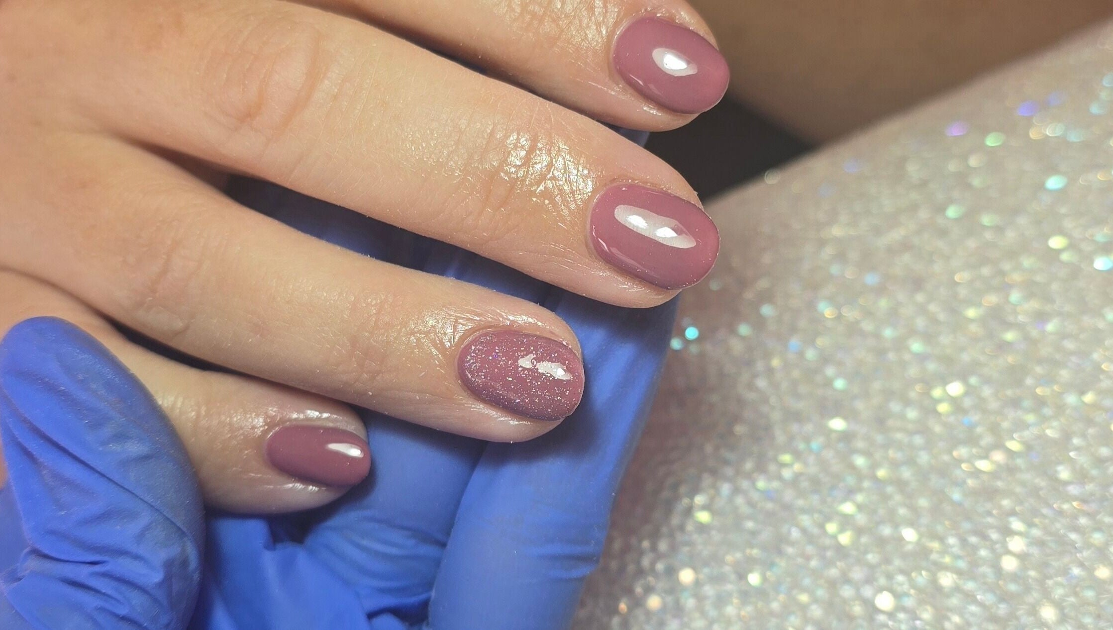 Elegant pink gel nails with glitter accent by Nailed It By Laura, Carluke, Scotland, GB.