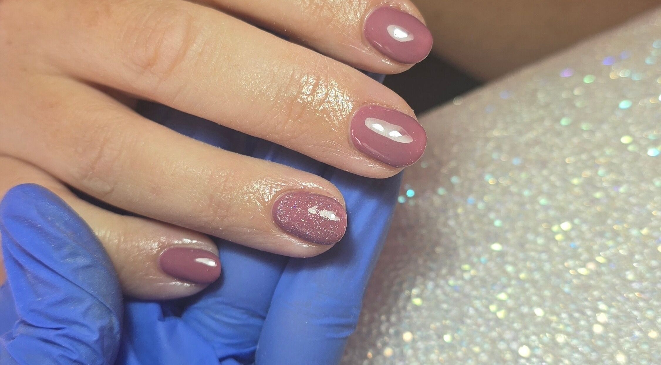 Elegant pink gel nails with glitter accent by Nailed It By Laura, Carluke, Scotland, GB.