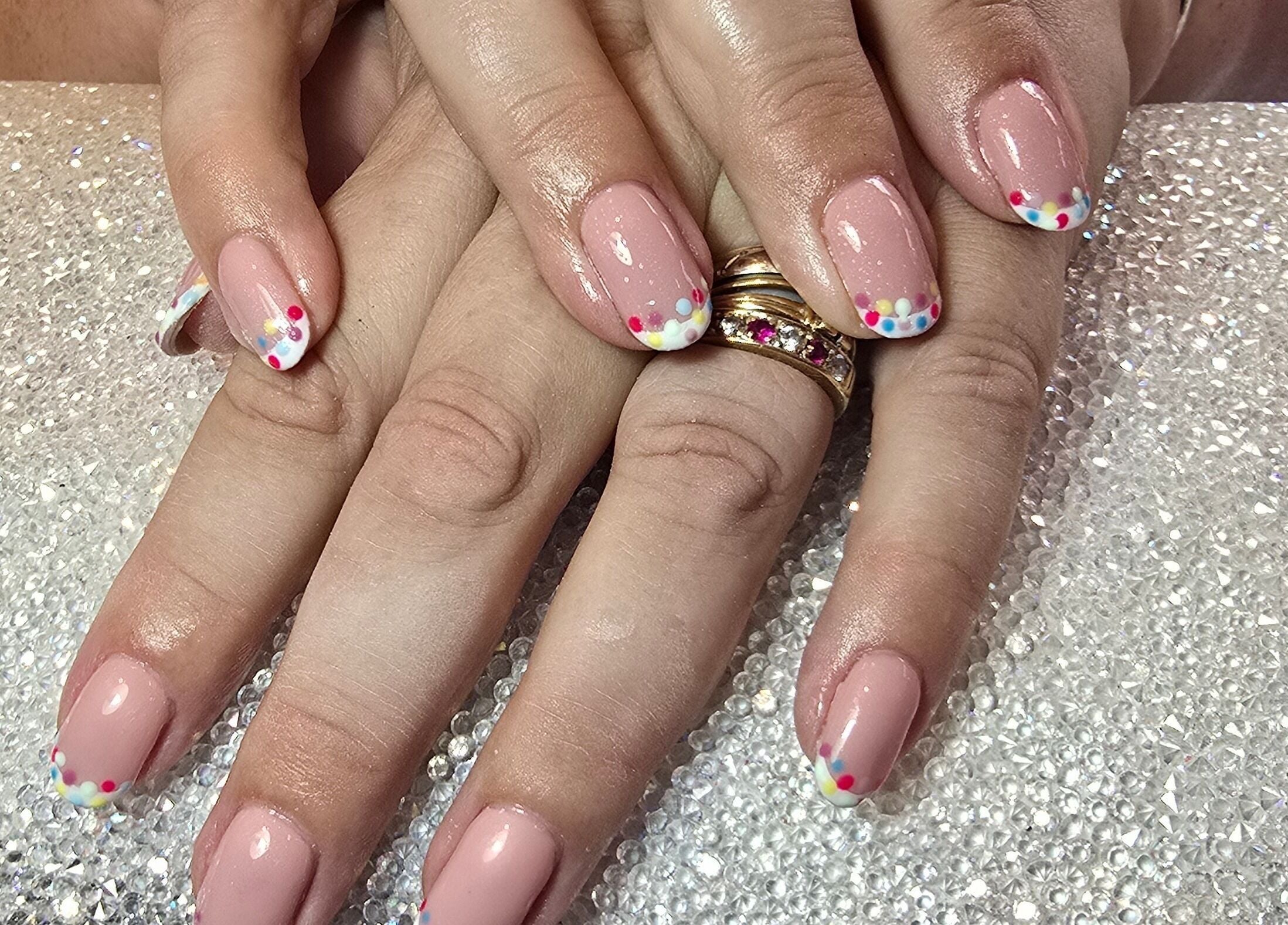 Elegant polka dot nail art by Nailed It By Laura in Carluke, Scotland, GB on sparkling surface.