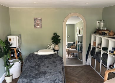 Relaxing massage room at Susan Stevens Massage Therapist, Churchdown, England, GB, with calming decor.