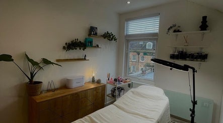Calm treatment room at Fine Line By V, Long Eaton, England, GB, with soft lighting and elegant decor.