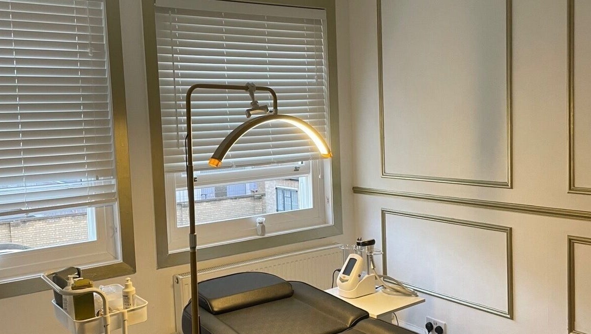 Tranquil treatment room at Truly Aesthetically Yours, Peterborough, England, GB featuring elegant decor.