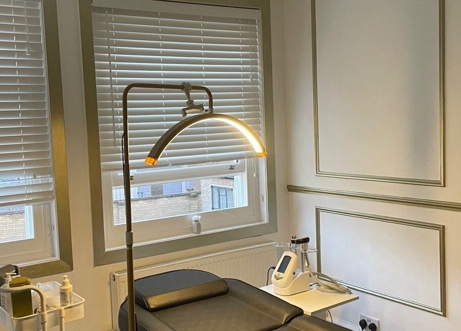 Tranquil treatment room at Truly Aesthetically Yours, Peterborough, England, GB featuring elegant decor.