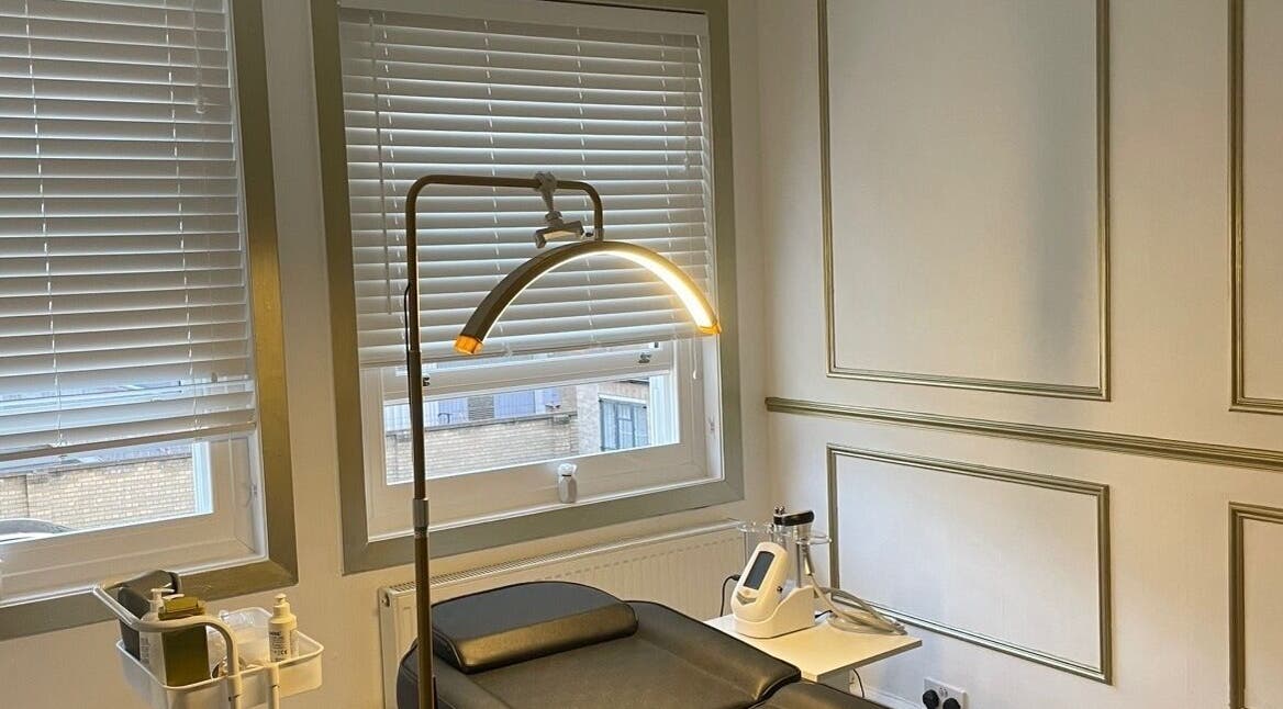 Tranquil treatment room at Truly Aesthetically Yours, Peterborough, England, GB featuring elegant decor.