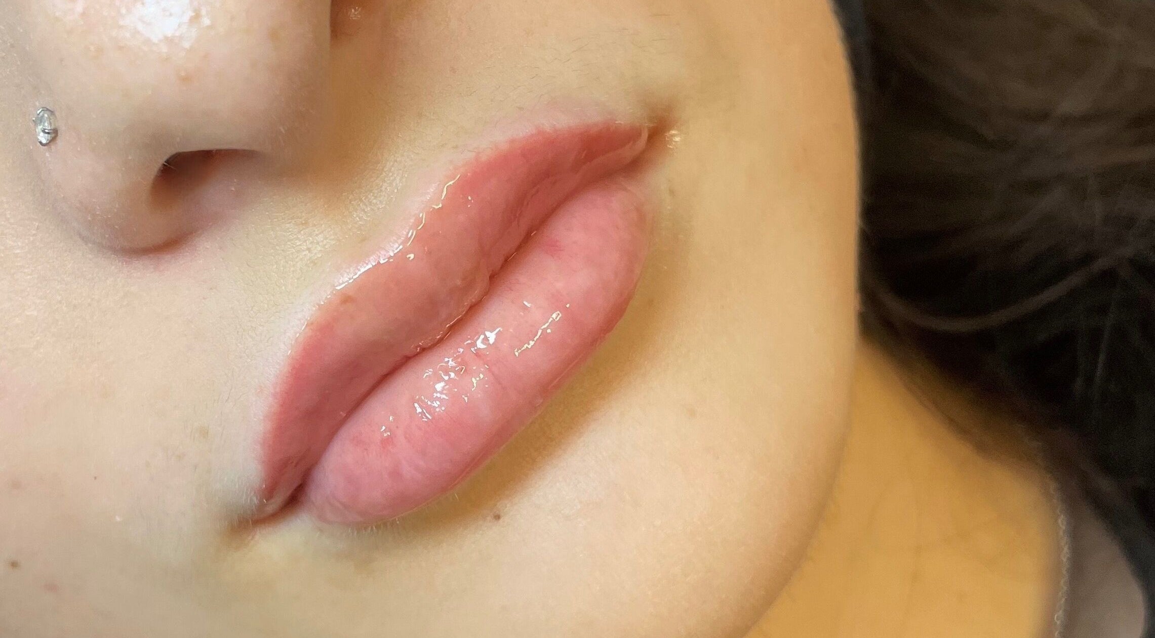 Luscious lips with gloss at Truly Aesthetically Yours, Peterborough, England, GB. Perfect results.