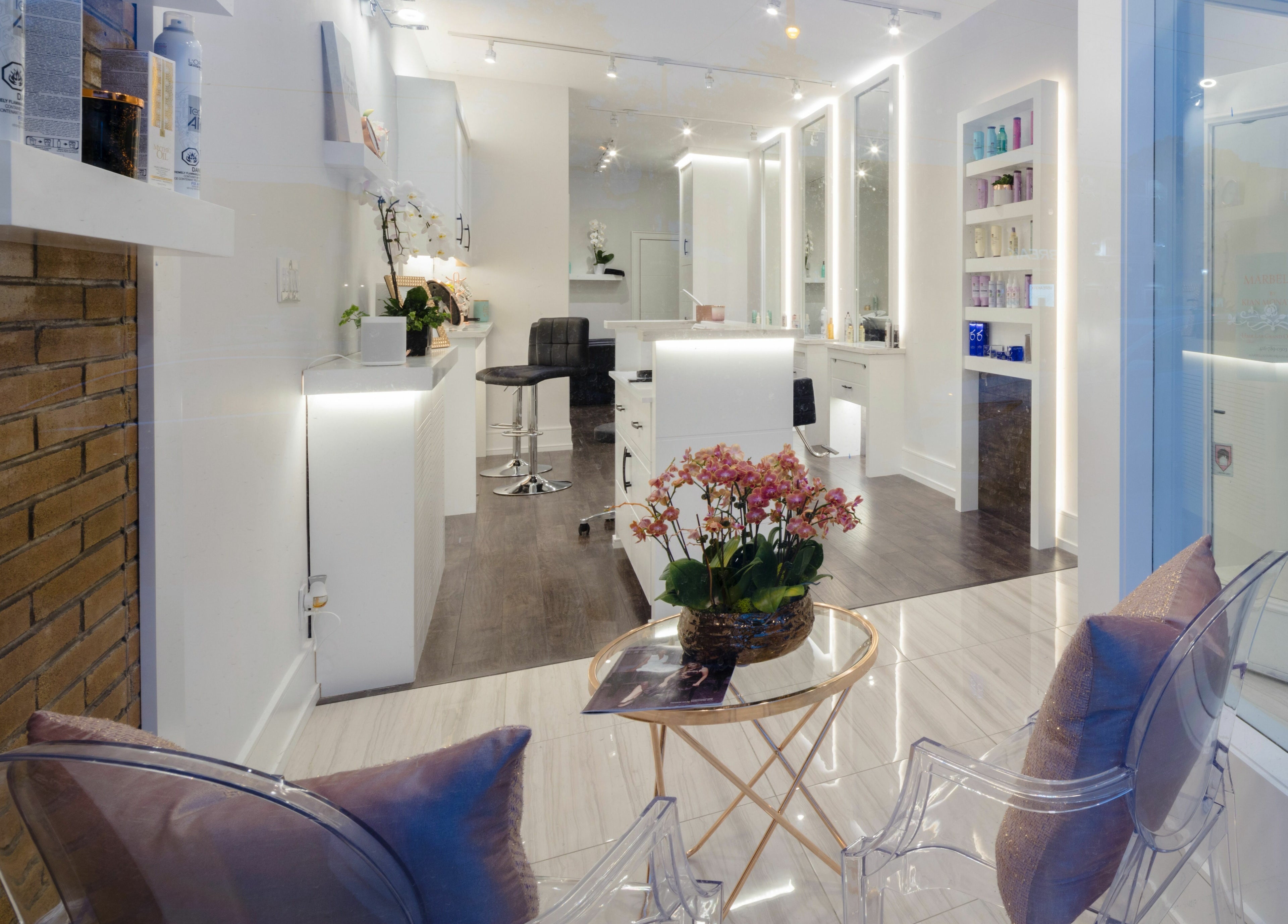 Chic interior of Marbella Hair Lab, Toronto, Ontario, CA with sleek decor and a welcoming ambiance.